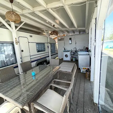 Sea Caravan On The Campsite *